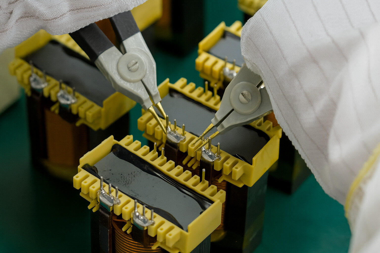 Coil and transformer winding in production